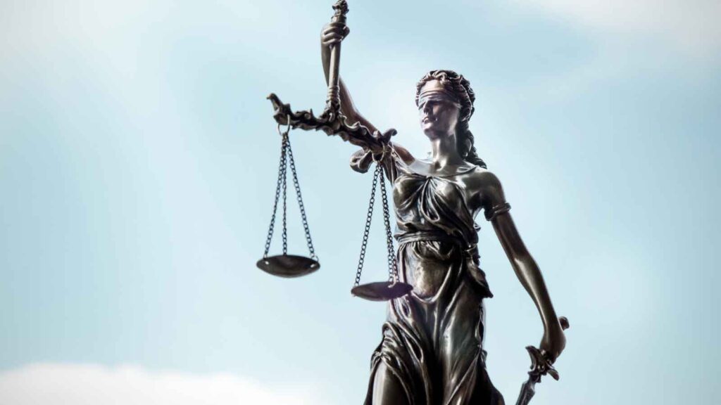 A statue of Lady Justice holding scales.