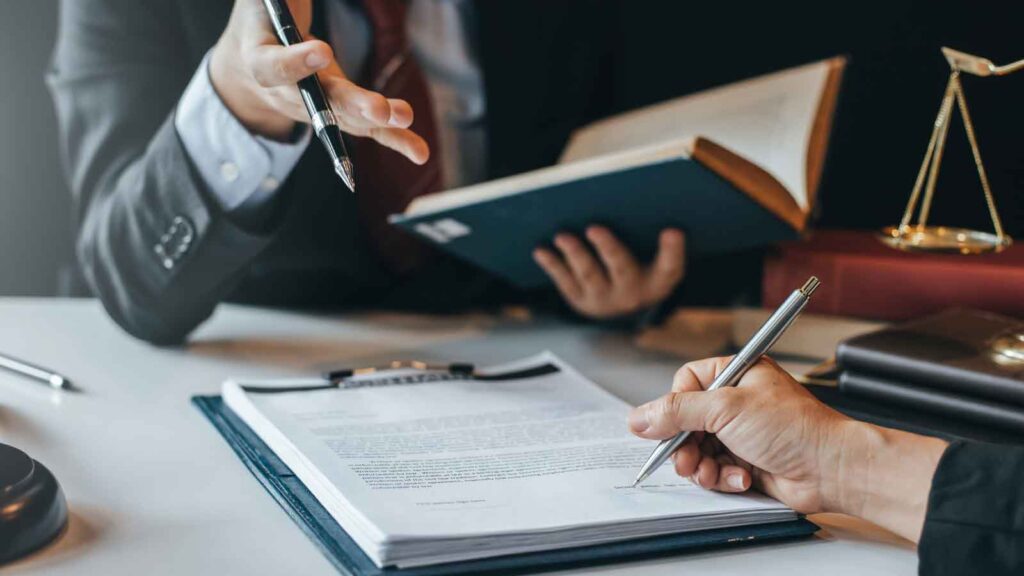 Lawyers discussing legal documents during a consultation