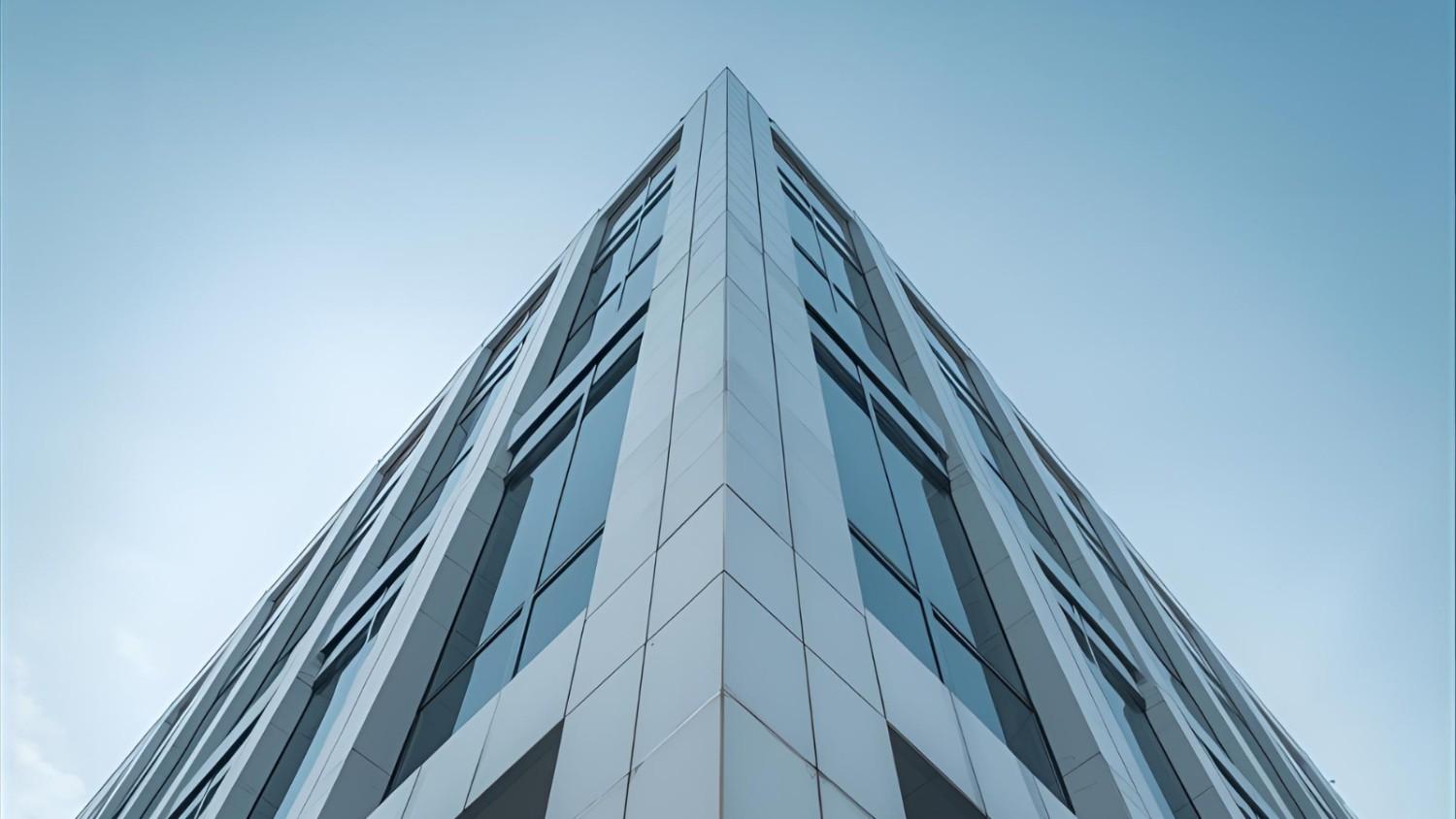 Modern commercial building exterior with clean architectural lines and glass surfaces.